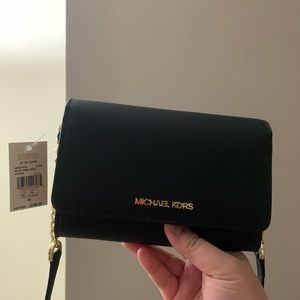 Selling my MK phone bag. 💯 % authentic.